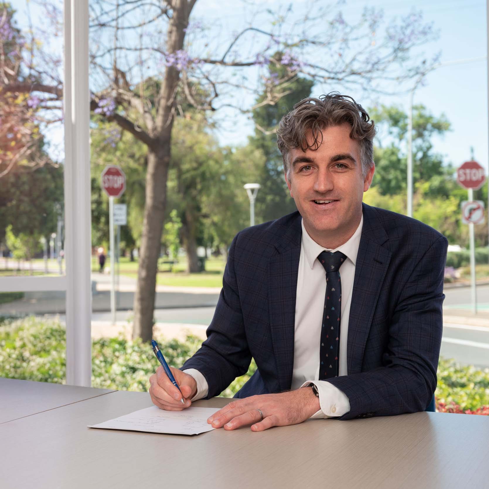 Sunlit interior doorway with timber floorboards